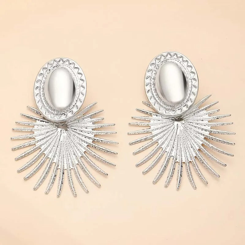 Silver Radiant Sunburst Pattern & Oval Shape Earrings