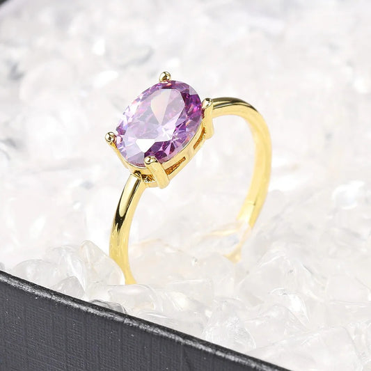 Gold Radiant Oval Purple Gem & Polished Band Ring