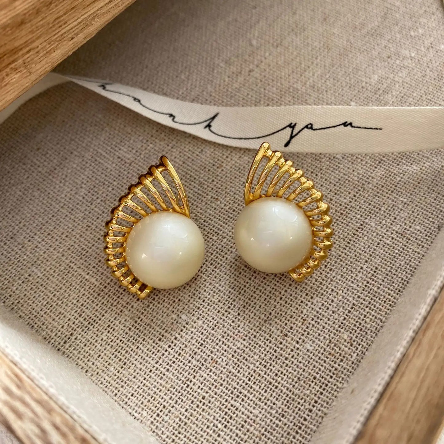 Gold Radiant White Round Pearl Earrings