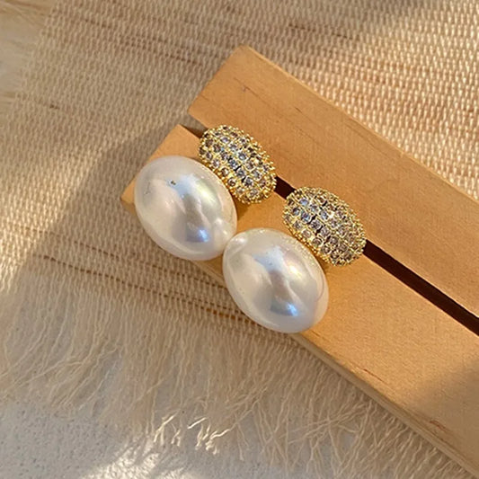 Gold Oval Pearl Drop Stud Earrings